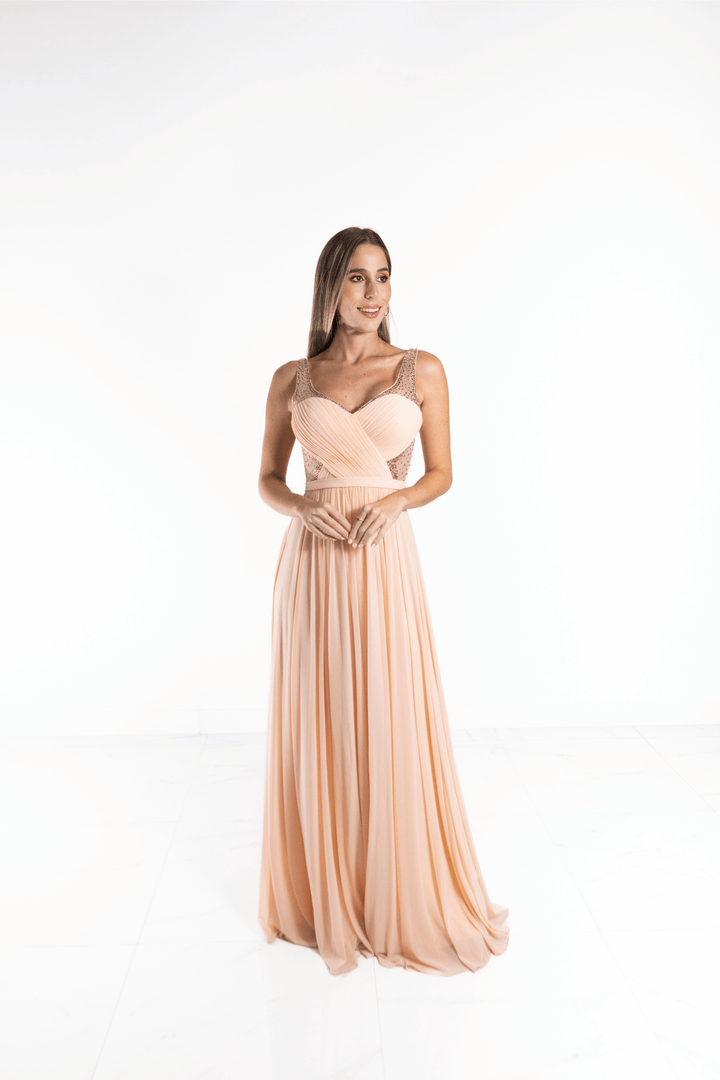 Vestido largo rosa palido con transparencias